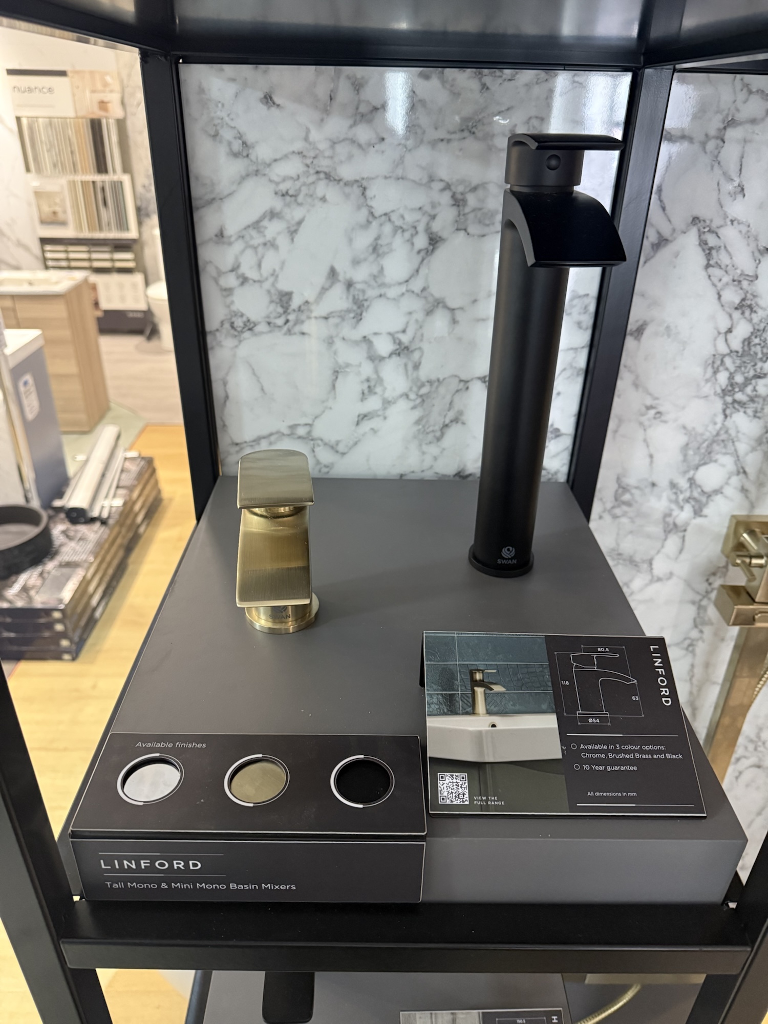 Swan Linford taps on display
