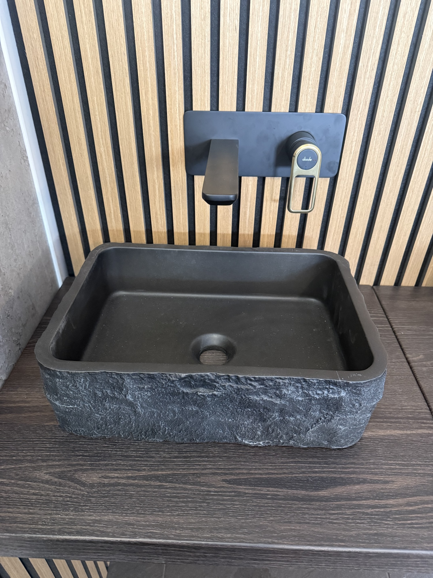 Left-hand display with Scudo Roc rectangle basin and Abode Leverto tap